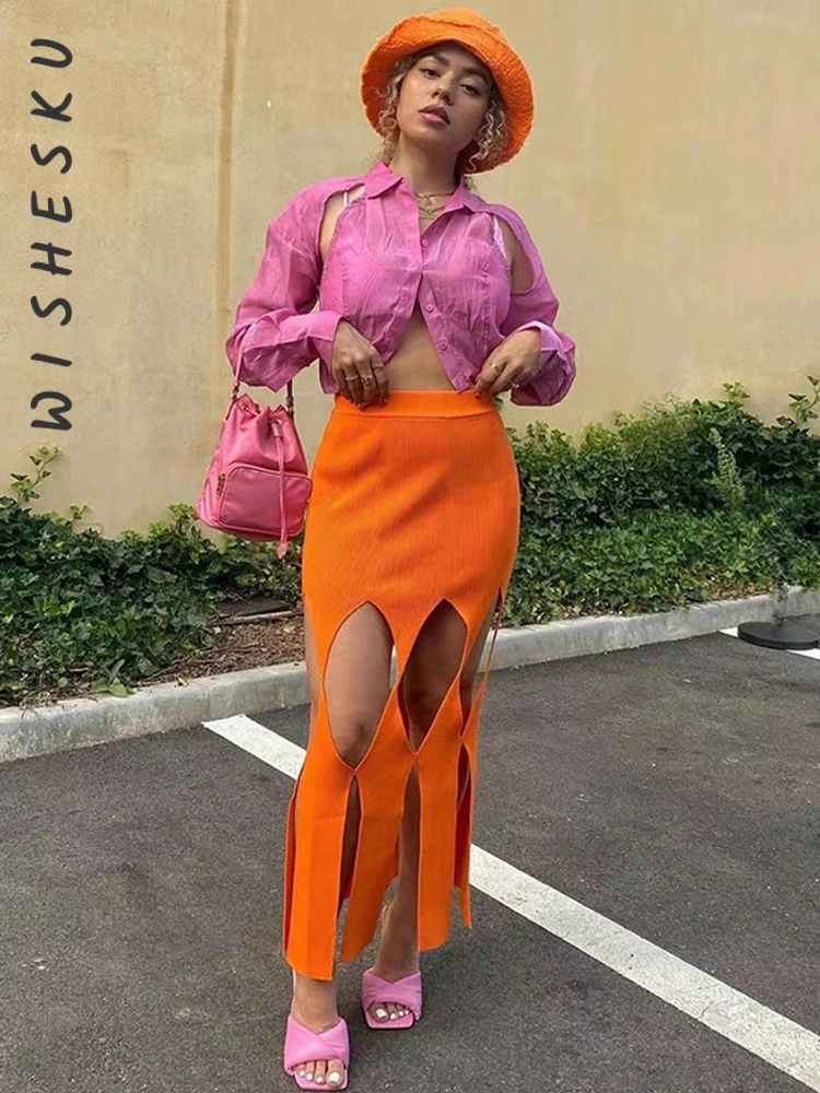 

Женская трикотажная длинная юбка-карандаш с разрезом и вырезами