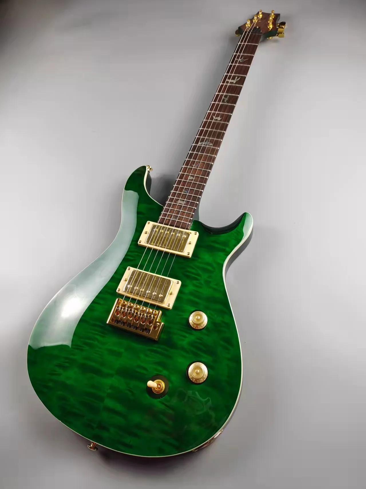 

Green big flower PRS, the body is a piece of wood, in stock, fast shipping, free shipping
