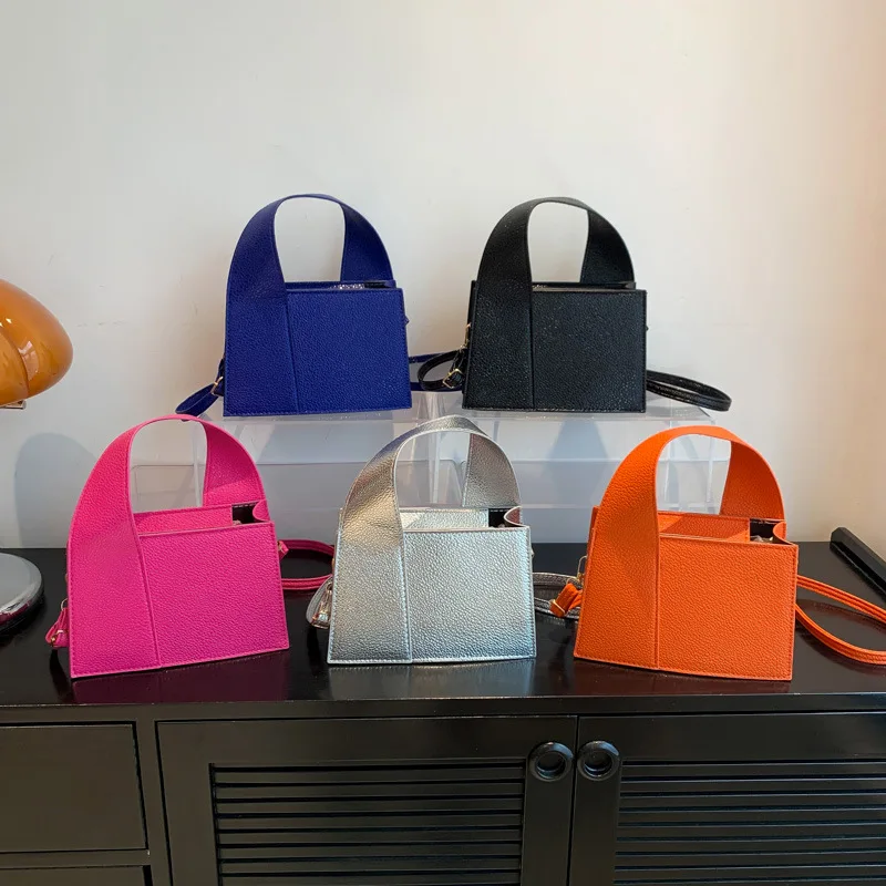 

Trendy New Casual Fashion Daily Temperament Simple Ins Niche Design Candy Color Personality Handheld Shoulder Pu Crossbody Bag