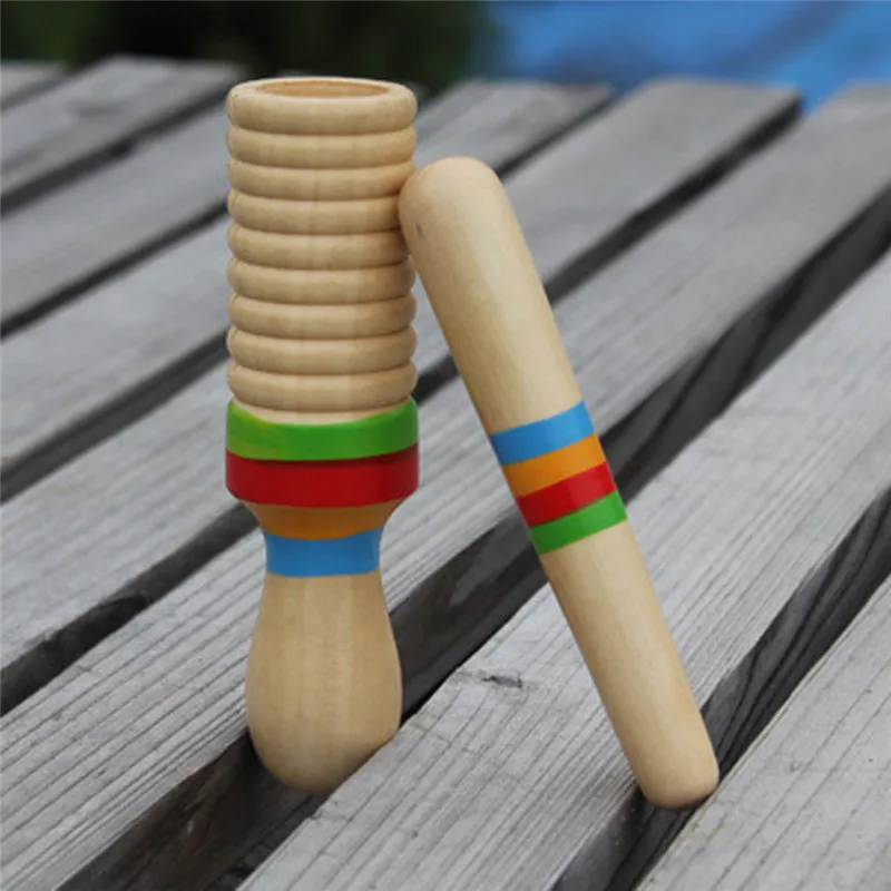 

Деревянный музыкальный инструмент, детские игрушки, звуковая трубка, маленькое кольцо с одной резьбой, перкуссионный цилиндр, бочка лягушк...