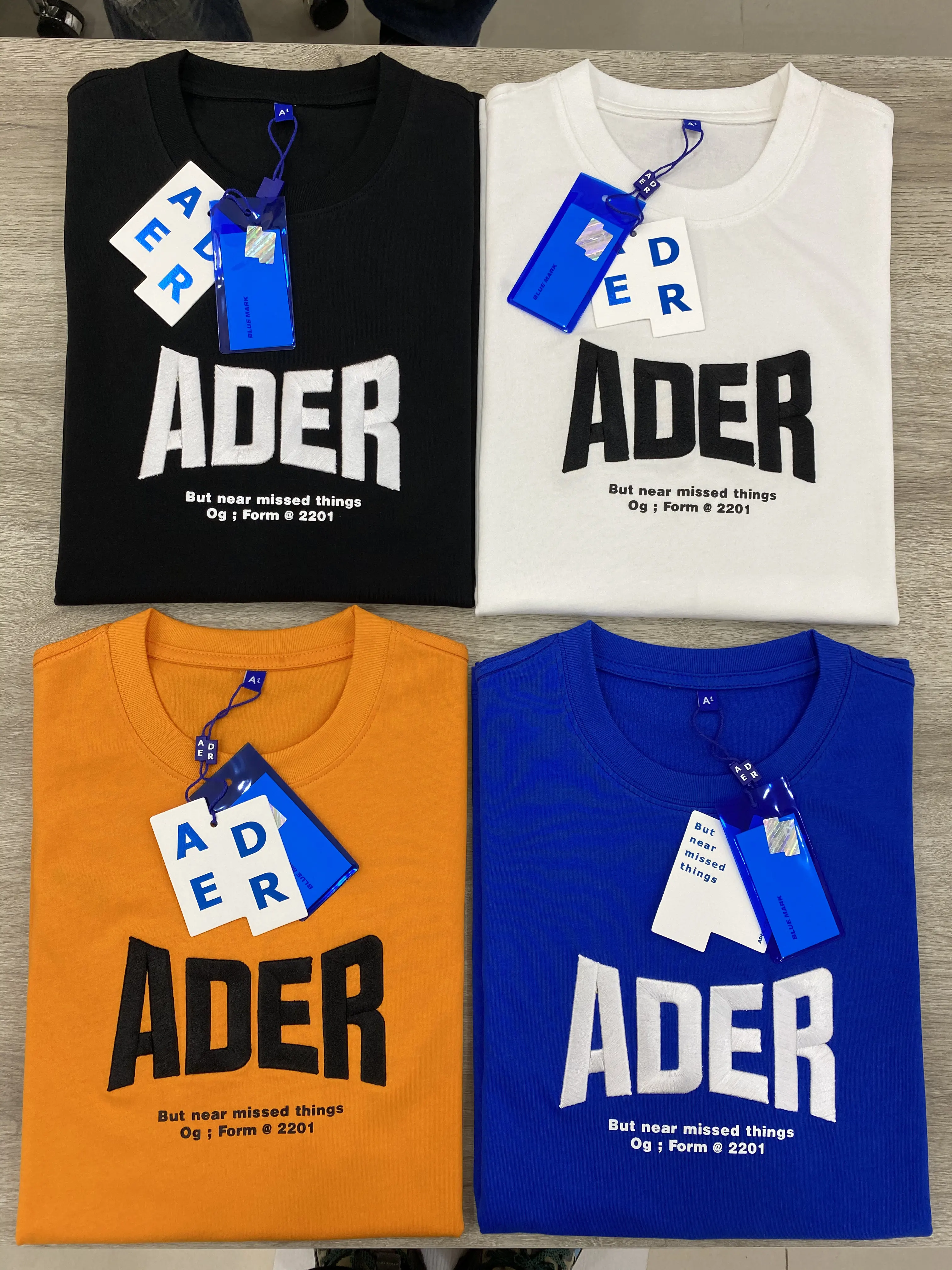 

Ader error T-shirt Korean fashion brand letter logo embroidered origami pattern men's women's black oversized T Shirt Top