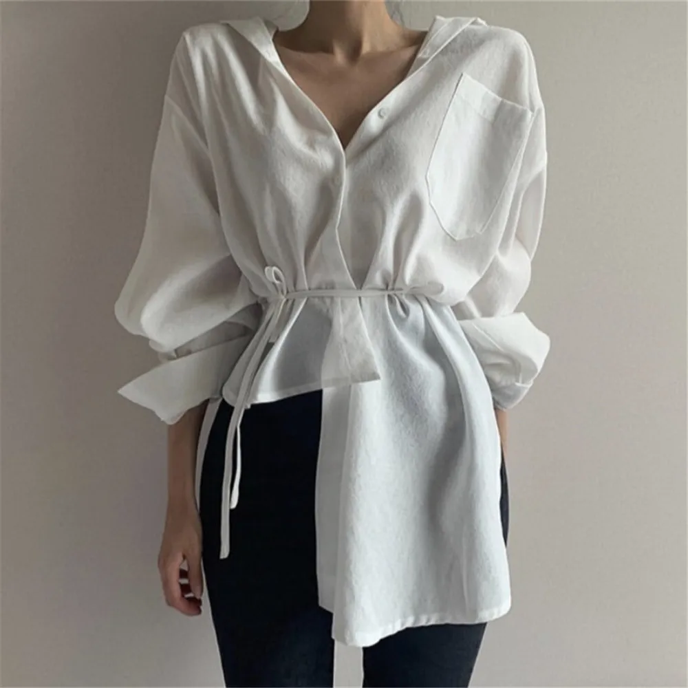 

Женская блузка однотонная французская нишевая рубашка нестандартного дизайна с лацканами однобортная рубашка с завязкой на талии и длинны...