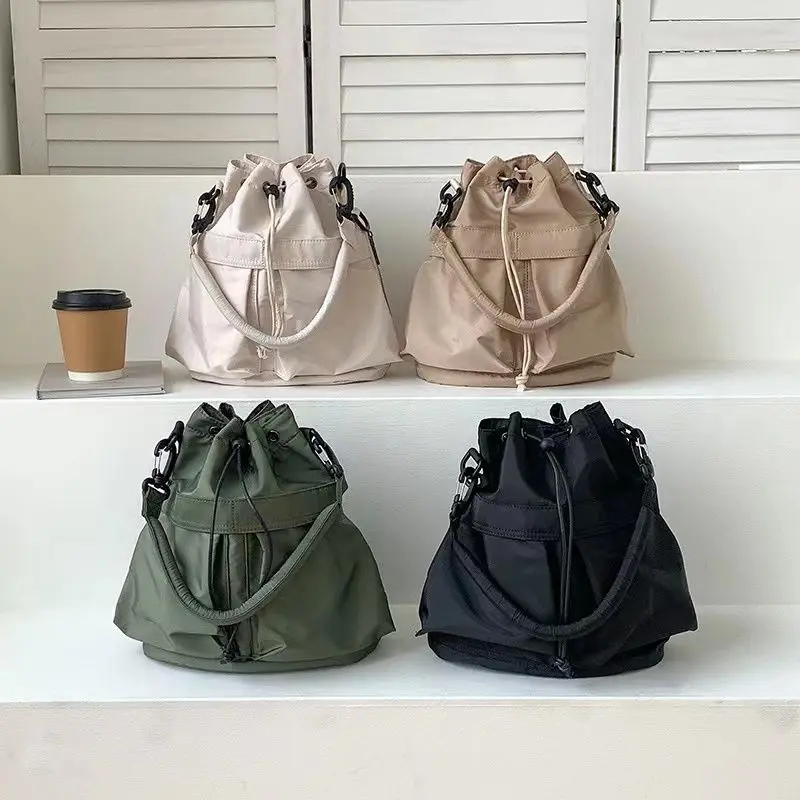 

Korean style fashion nylon drawstring bucket bag personality versatile handheld shoulder messenger bag daily leisure bag