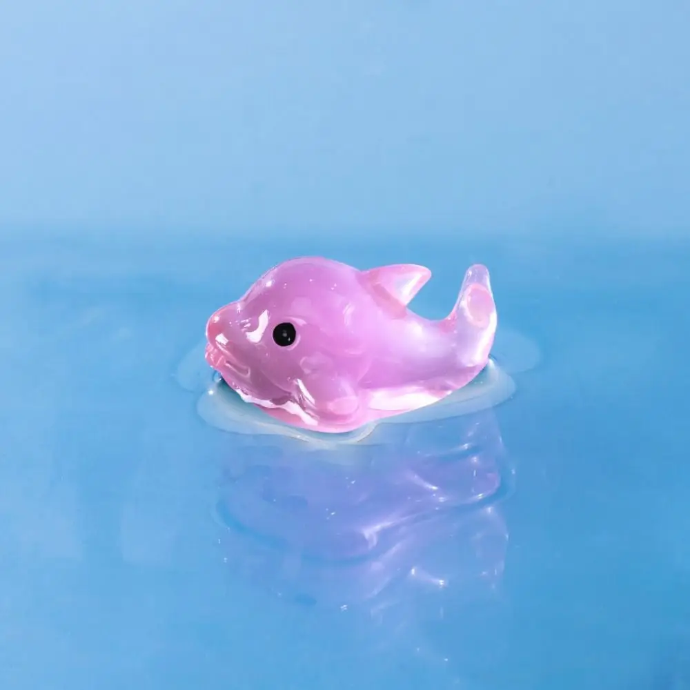 

Резиновые фигурки дельфинов