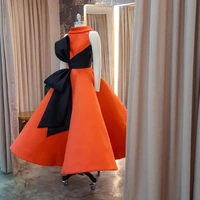 xijun new design saudi arabia orange satin prom dresses with black bow pleats evening gowns tea length formal party dress