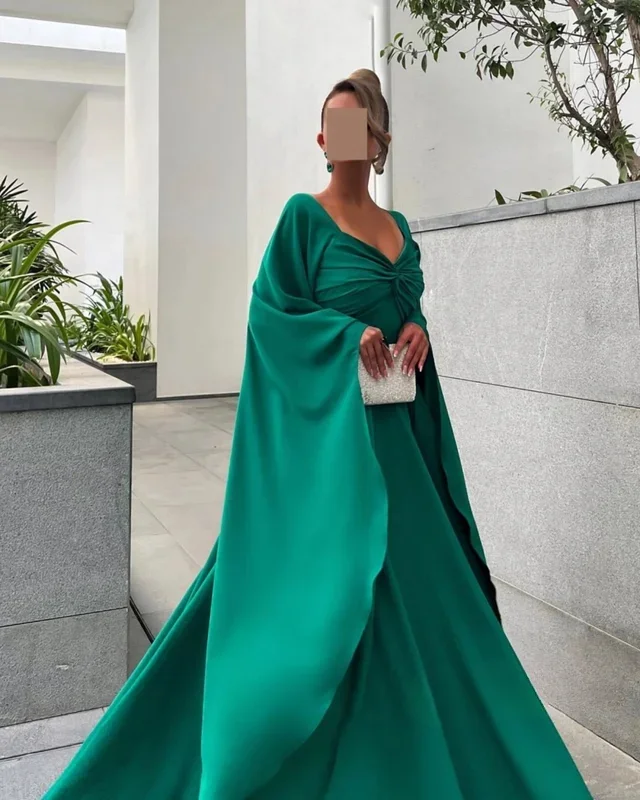 Изысканные трикотажные платья миди трапециевидной формы с v-образным вырезом по