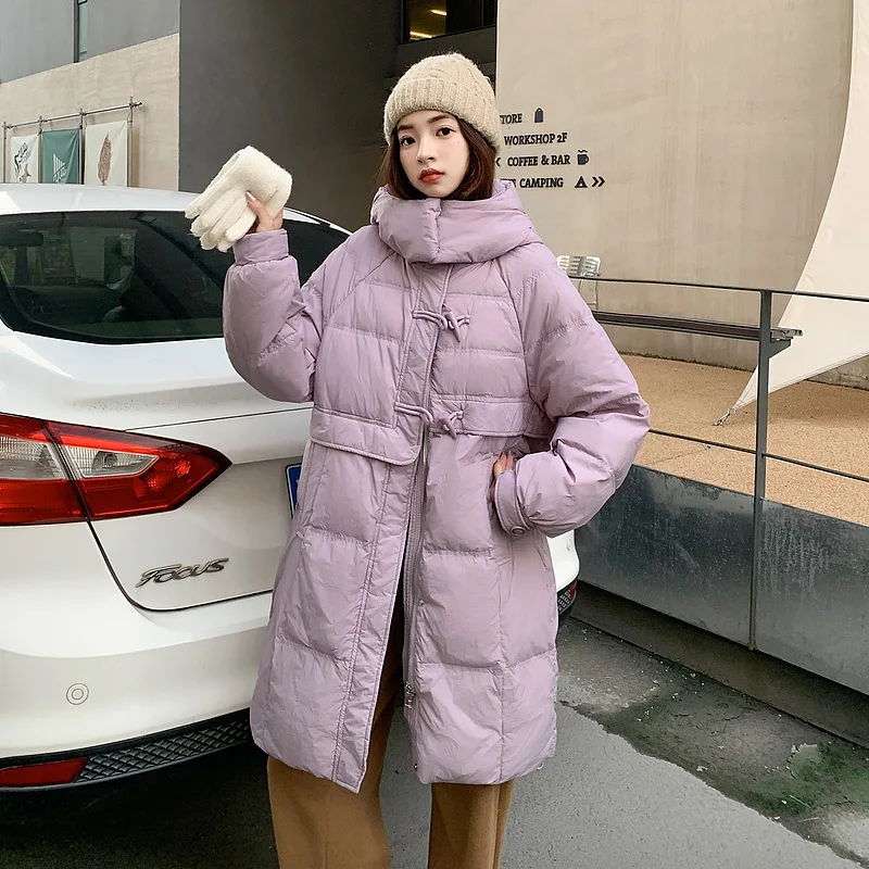 Женский пуховик средней длины