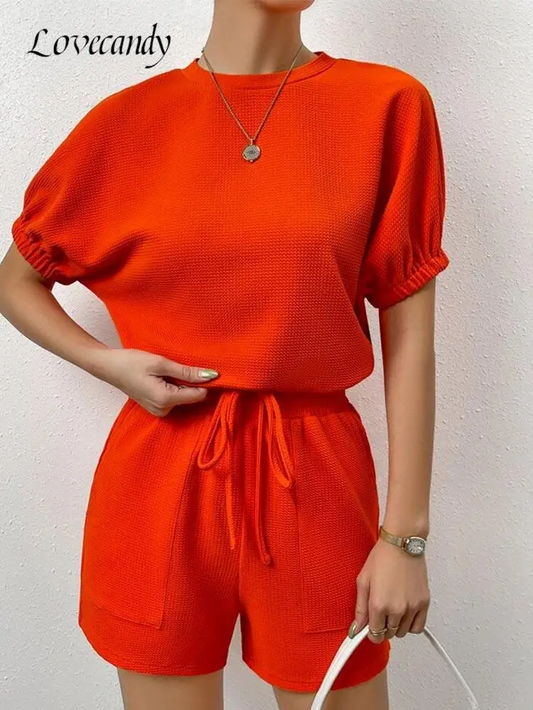 

Шикарный свободный Женский комплект из двух предметов, повседневный однотонный костюм с круглым вырезом и эластичными рукавами, шорты на шнуровке, модная женская одежда 2023