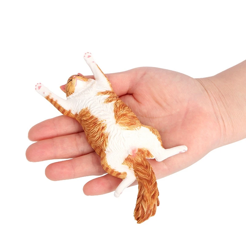 

Фигурка спящего кота из ПВХ