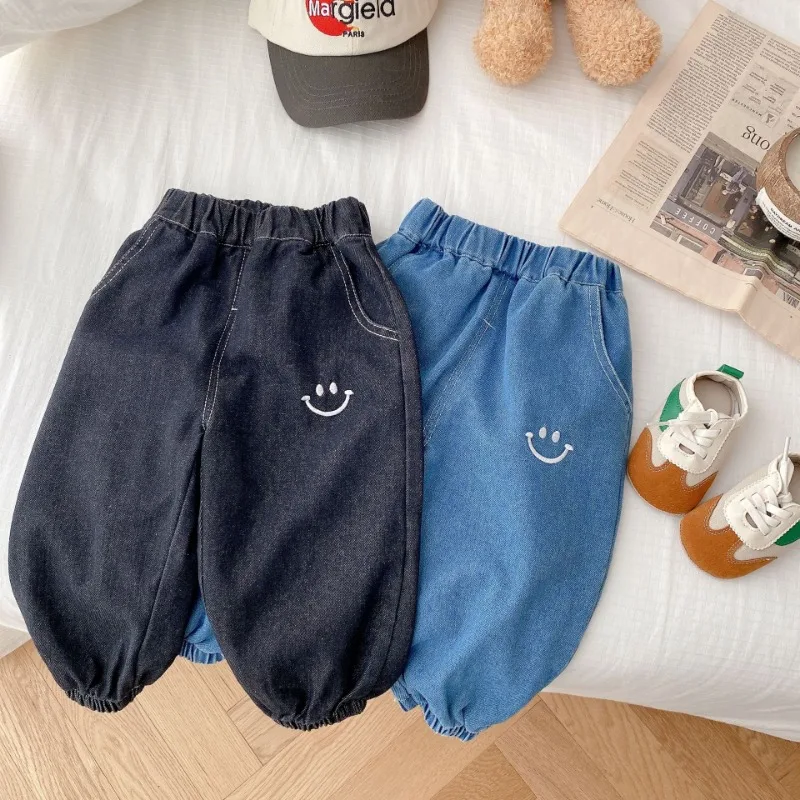 

Fashion Boys cartoon smile jeans Baby girls soft loose casual Trousers Kids all-match denim pants