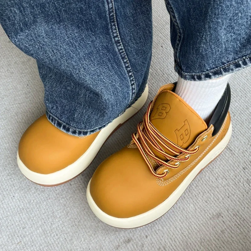 Женские ботинки на толстой подошве желтые брендовые платформе с круглым носком