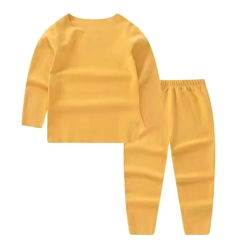 

2022 Children's Pajamas Set Seamless Plus Velvet Self-heating Clothes Kids Spring And Autumn Solid Color Thermal Underwear Set