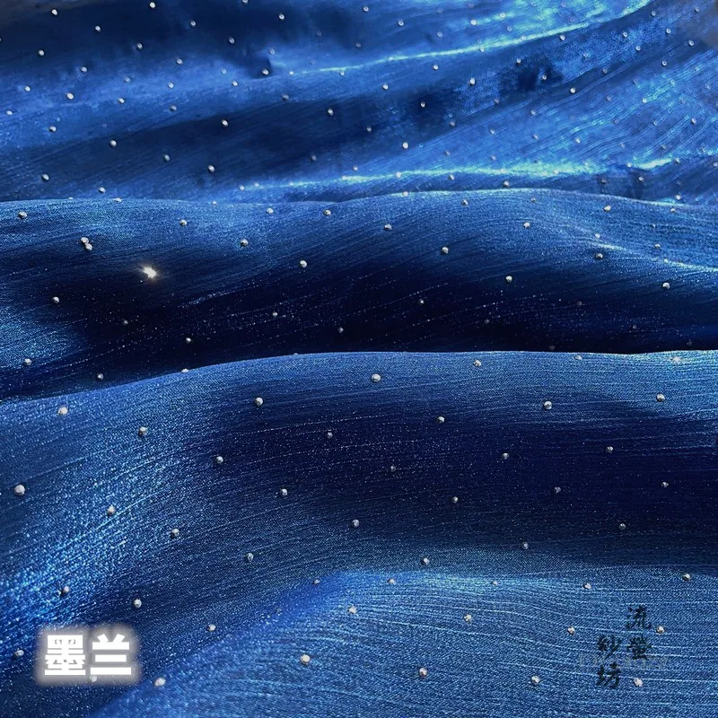 Тёмно-синяя блестящая ткань из органзы с эффектом сверления