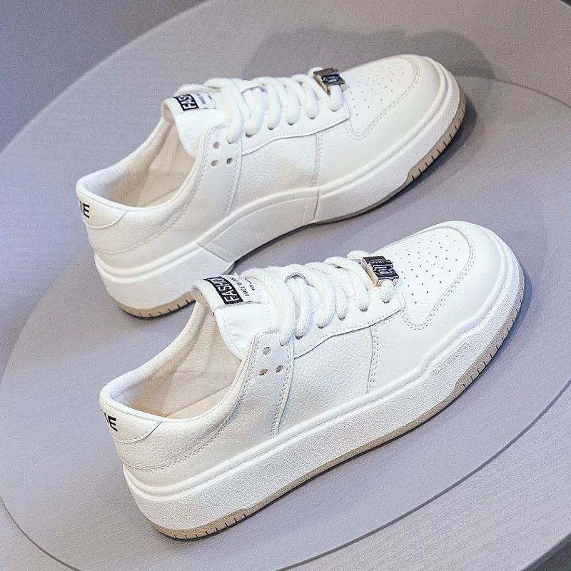 

Женские кроссовки из натуральной кожи, с вулканизированной подошвой