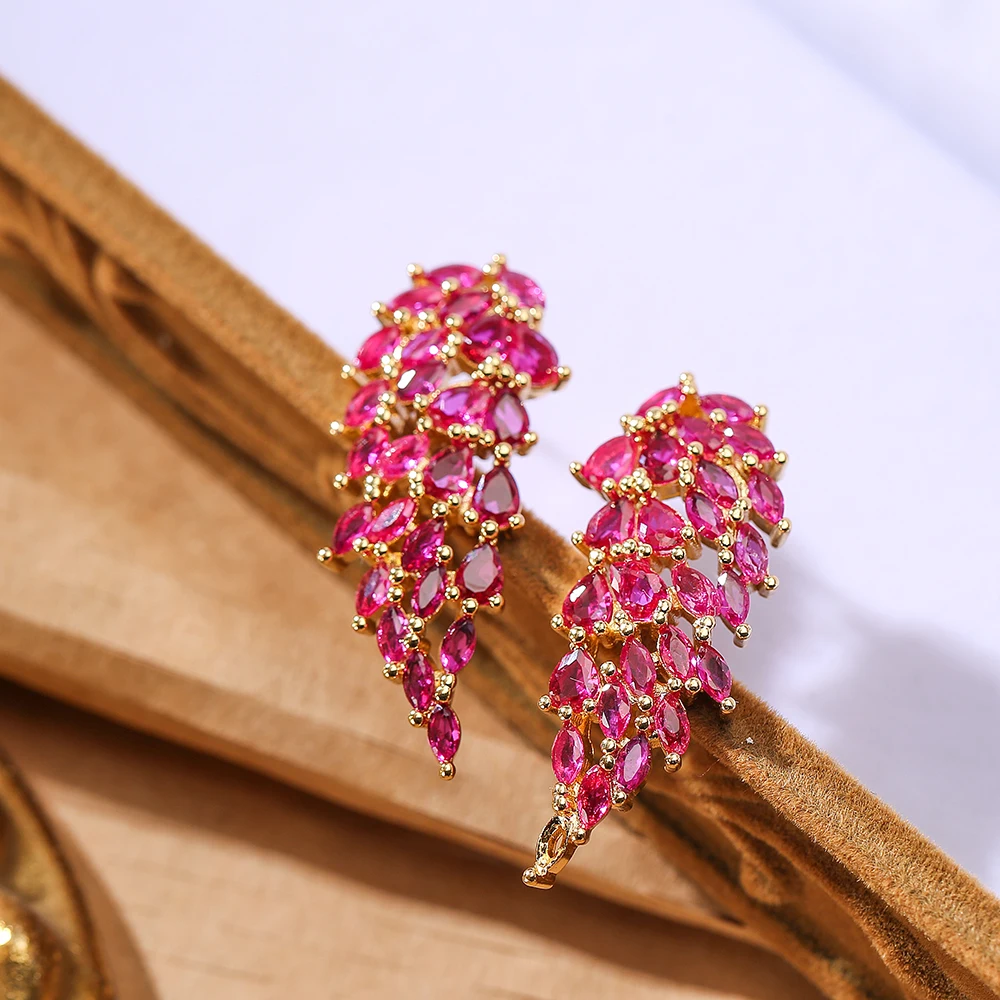 Серьги-подвески в виде листьев с фианитом