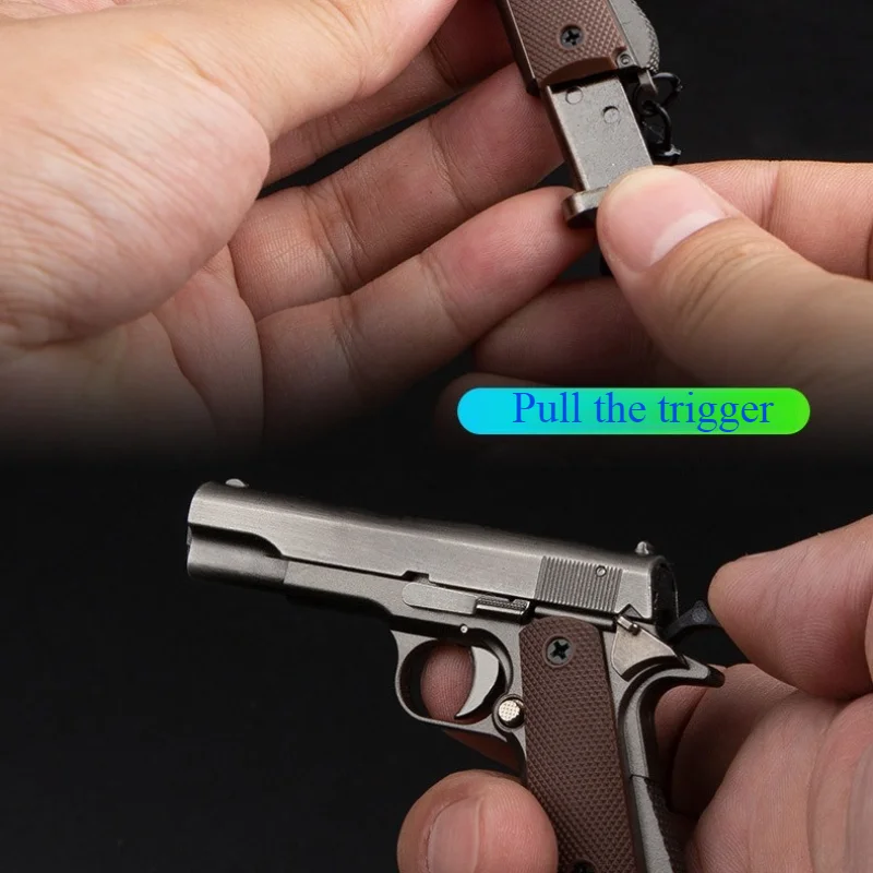 Фото Новая модель пистолета 1:3 Colt 1911, брелок для пистолета, съемный чехол из сплава, игрушки, украшения, ремесла, фигурки и миниатюры №4