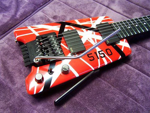 

In Stock Eddie Edward Van Halen 5150 Red White Black Strips Headless Electric Guitar EMG Pickups Tremolo Bridge Black Hardware