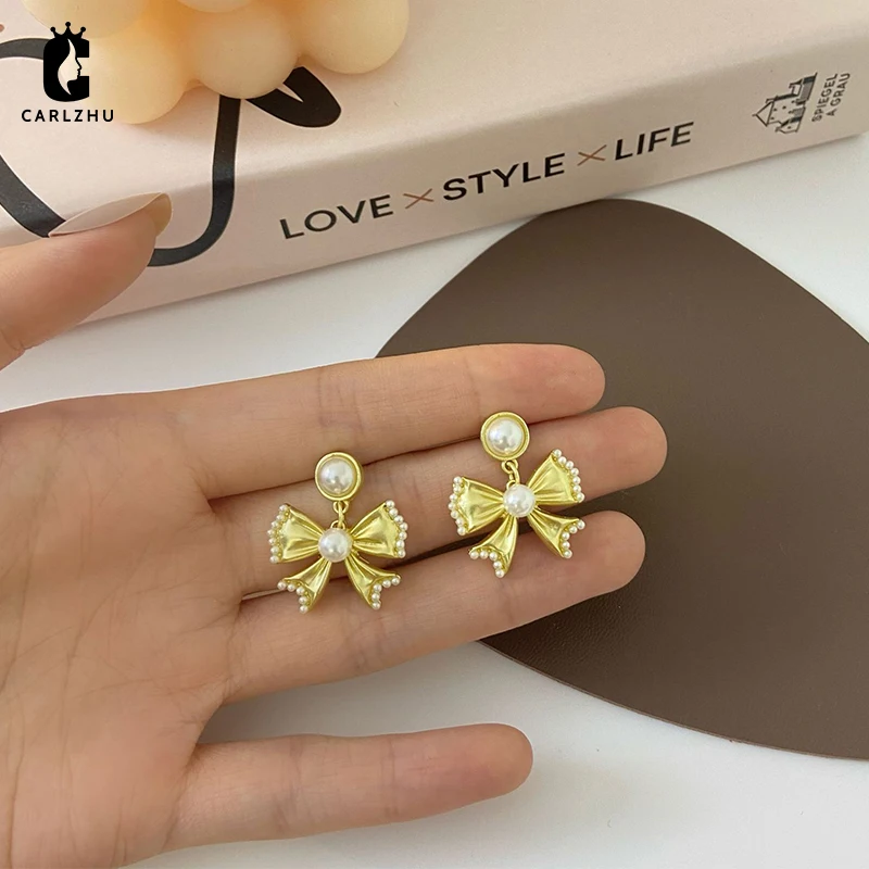 

2022 New Korea Gold Color Simulated Pearl Bowknot Drop Earrings Sweet Non Piercing Ear Clip Earring for Women Girl Party Jewelry