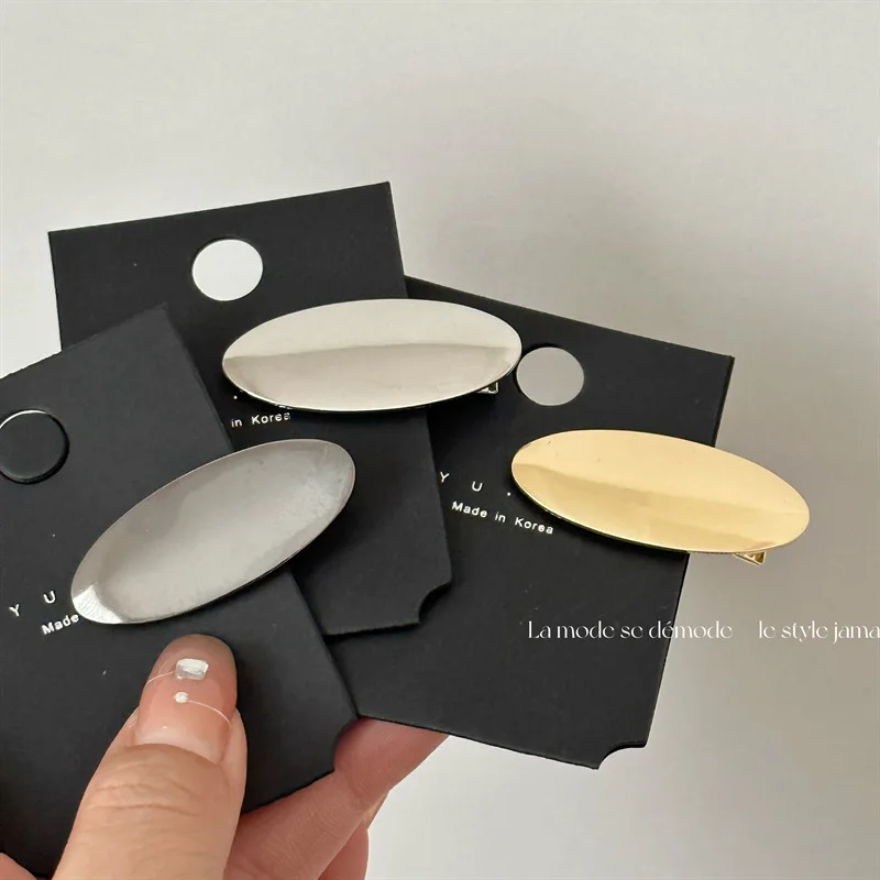 

Korean version simple alloy oval duckbill clip Versatile spring clip temperament bright metal clip banger clip hair ornament
