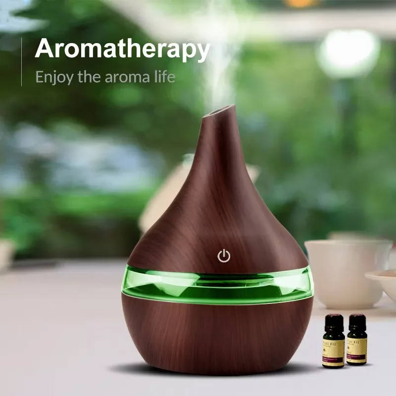 

Electric Air Humidifier Essential Aroma Oil Diffuser Ultrasonic Wood Grain Humidifier USB Mini Mist Maker 7 Color LED Light