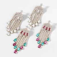 new european and american fashion alloy crystal inlaid acrylic tassel earrings womens fashion crossover earrings