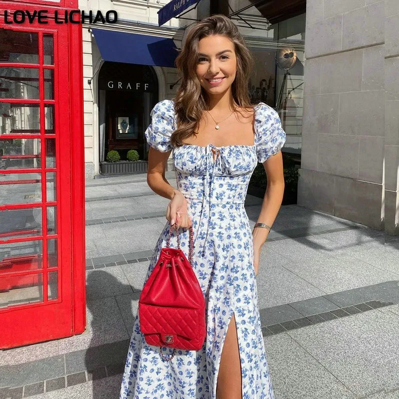 

Платье женское длинное с цветочным принтом, высоким разрезом и завязками спереди