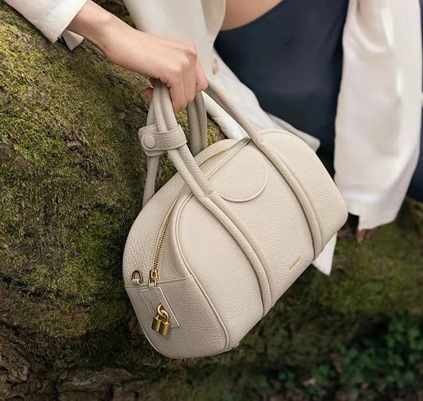 Trendy and stylish, minimalist bowling bag series, large capacity retro cowhide top layer, one shoulder portable crossbody bag