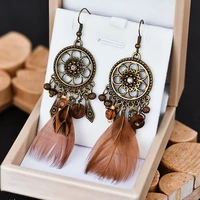 vintage brown feather tassel earrings female 2022 trendy round hollow flower crystal pendant earrings bohemian jewelry gifts
