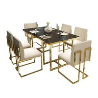 most fashionable modern design dining table set round marble top metal elegant table with comfortable chairs for best service