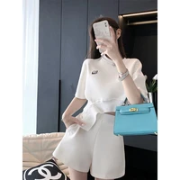 womens white sports suit two piece shorts asymmetrical leisure korean fashion summer showing the waist cropped top streetwear