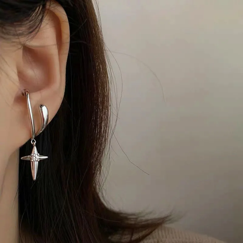 

Женские серьги-клипсы серебристого цвета, с крестом Иисуса
