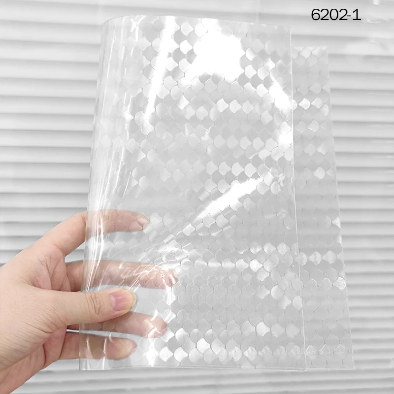 

Translucent PVC Emboss mermaid scale roll vinyl Colored Soft Plastic Film Fabric for DIY Making Craft Notebook Covers Protector