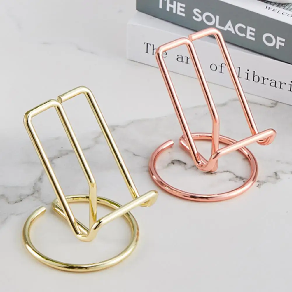 

Femoro Cell Phone Stand for Desk, Cute Metal Silver Cell Phone Stand Holder Desk Accessories, Compatible with All Mobile Phones