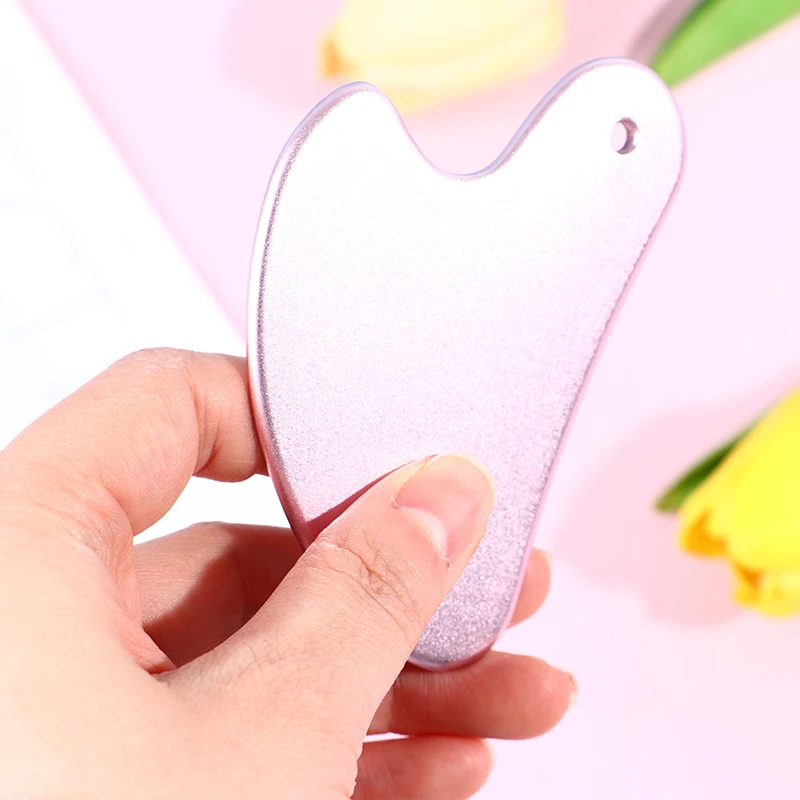 

Массажный скребок для лица из нержавеющей стали