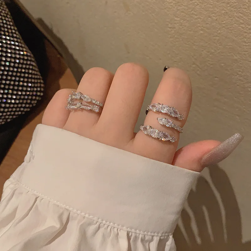 

RAKOL Luxury Marquise Cut Cubic Zirconia Geometric Finger Rings For Women Adjustable Jewelry Exquisite Party Dress Accessories