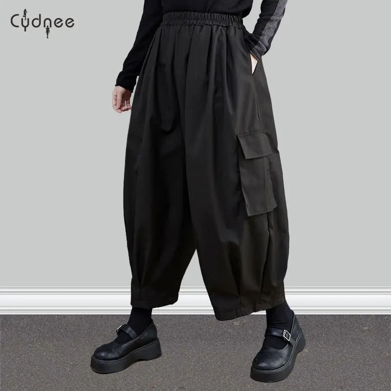 Женские широкие длинные брюки с высокой эластичной резинкой на талии и карманами