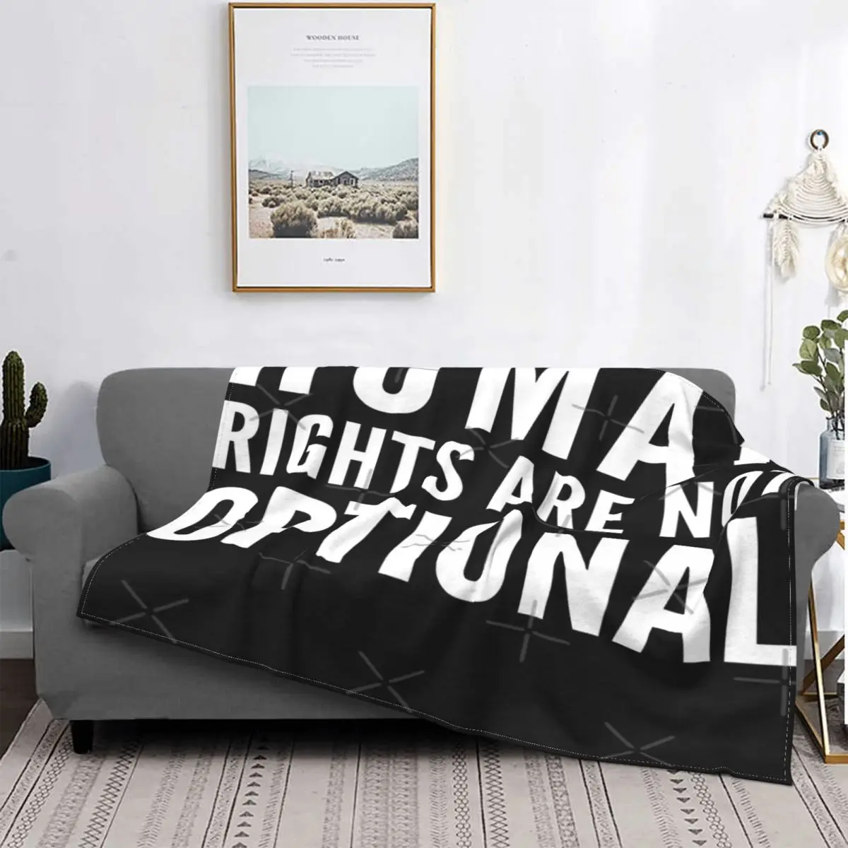 

Los derechos humanos no son opcionales, manta, colcha, cama, edredón a cuadros, manta con capucha a cuadros en el sofá