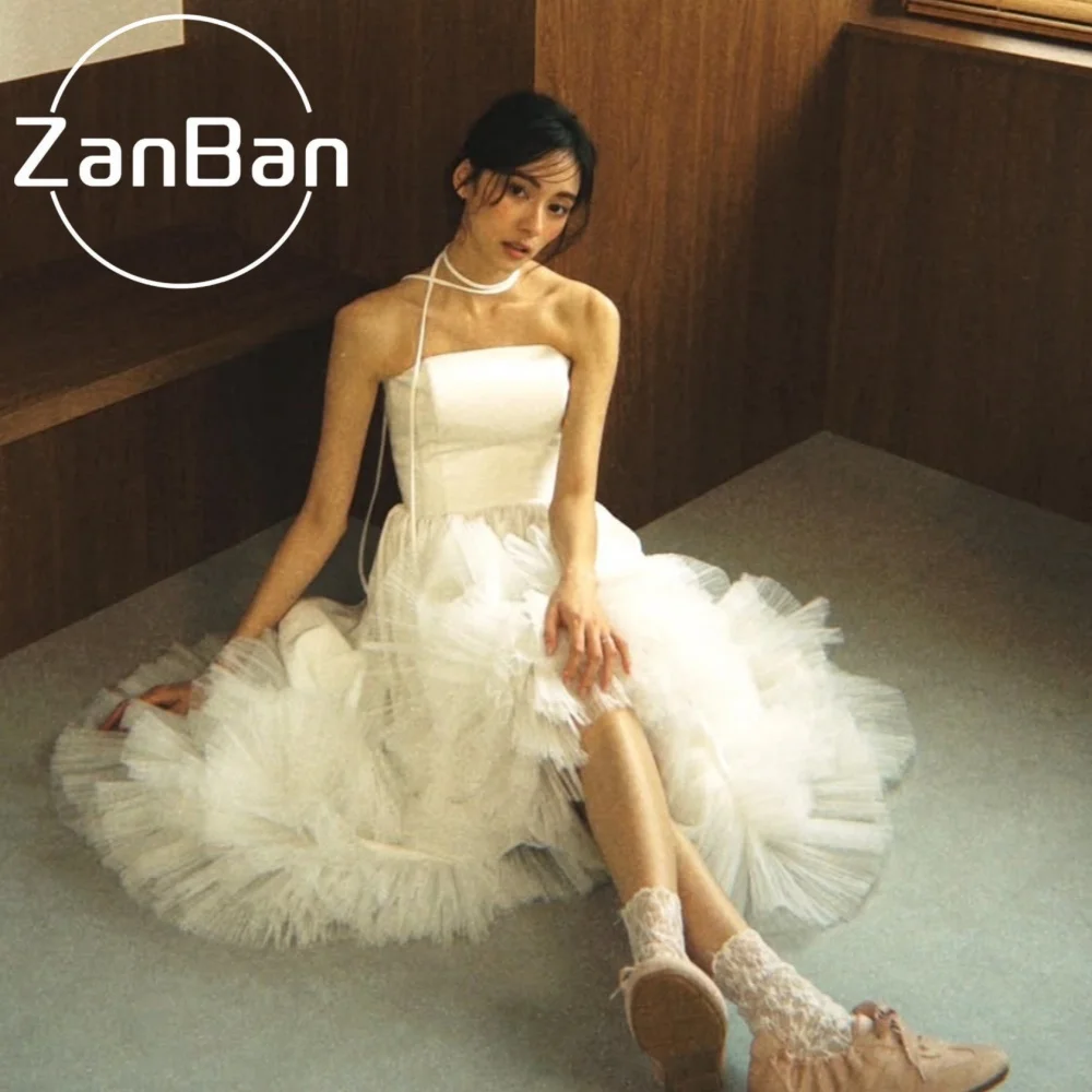 Фото Свадебное платье ZanBan Korea 2026: без бретелек, из тюля, плиссированное, для фотосессии, А-силуэт, многоярусное, без рукавов, с корсетом на заказ №1