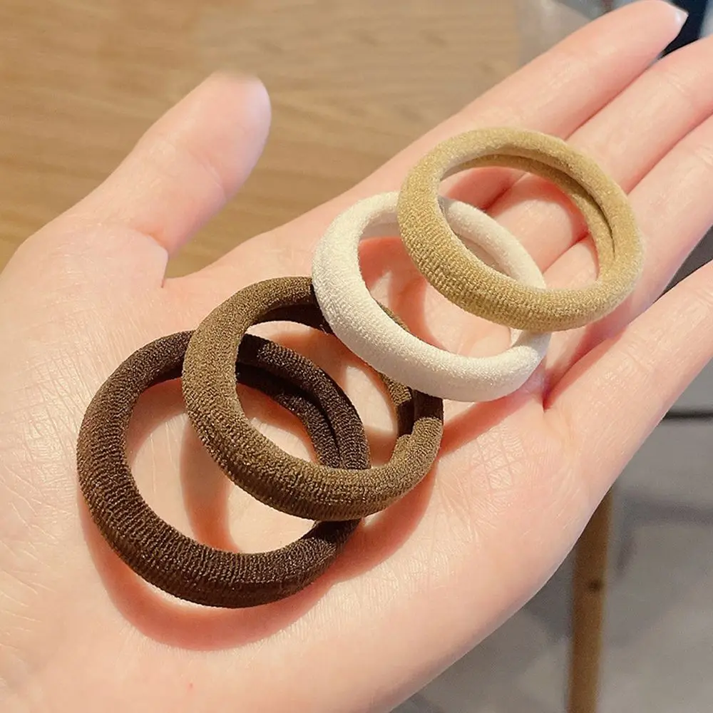 

Новые корейские элегантные женские резинки для волос 7 шт./компл. эластичные резинки для волос в виде волн для девочек и детей карамельных цв...