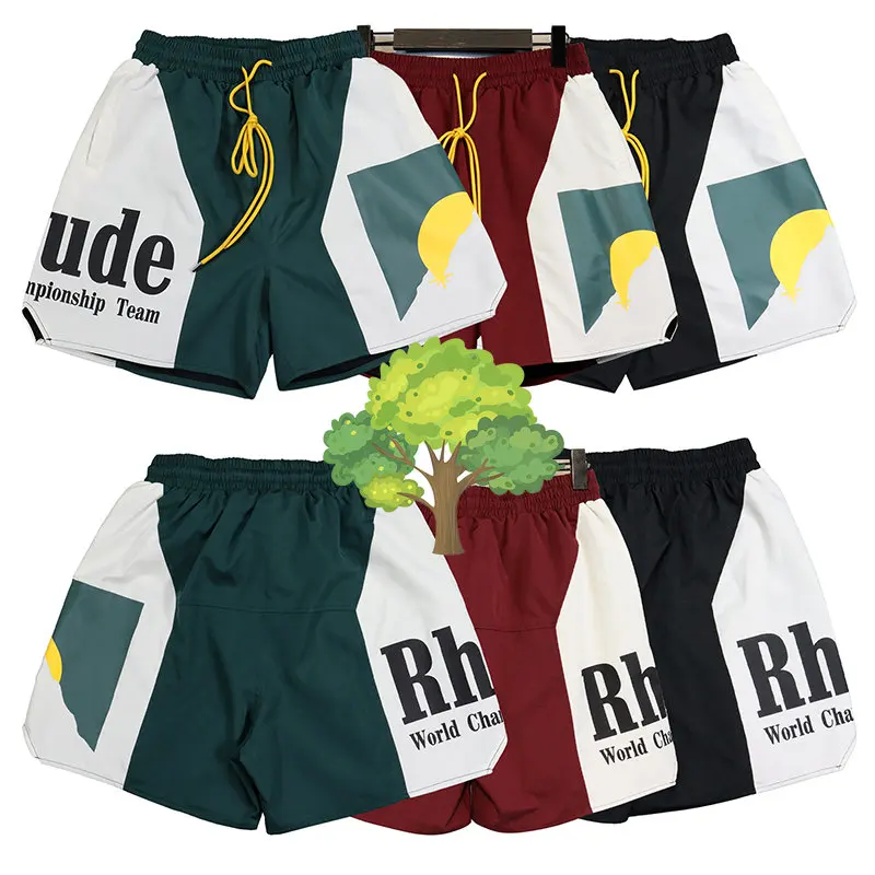

Rhude Panel Logo Short Sunset Letters Print Colorblock Sports Shorts High Street Men Women Yellow Drawstring Jogger