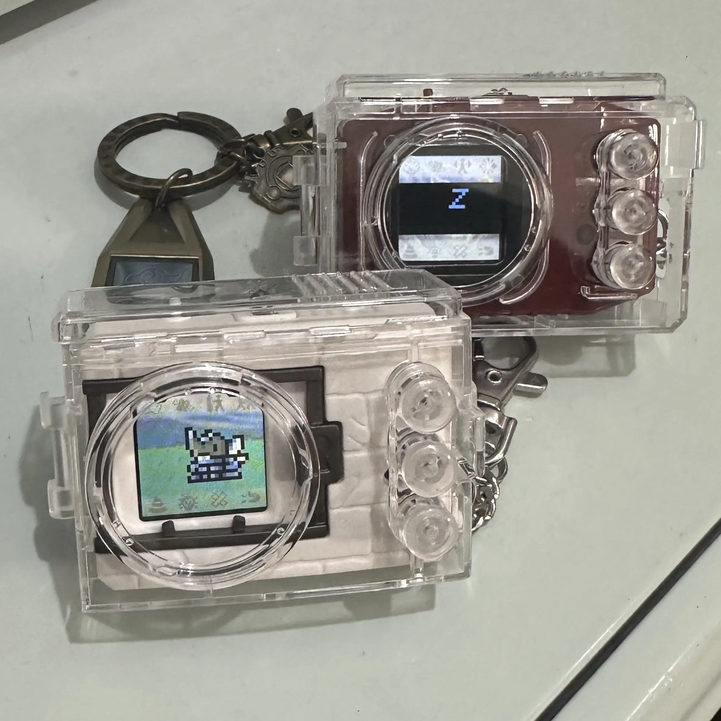 Фото Защитный чехол Bandai Digivice, полностью прозрачный, с блестящим голографическим узором и зажимом для ключей, для Pd200 Pd200 Sp Digital Monster №2
