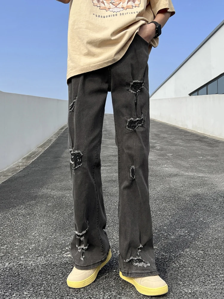 

Men Straight Leg Jeans Street Vibe Wide-Legged Y2K Baggy Denim Pants with Stretch and Distressed Details Comfortable and Trendy