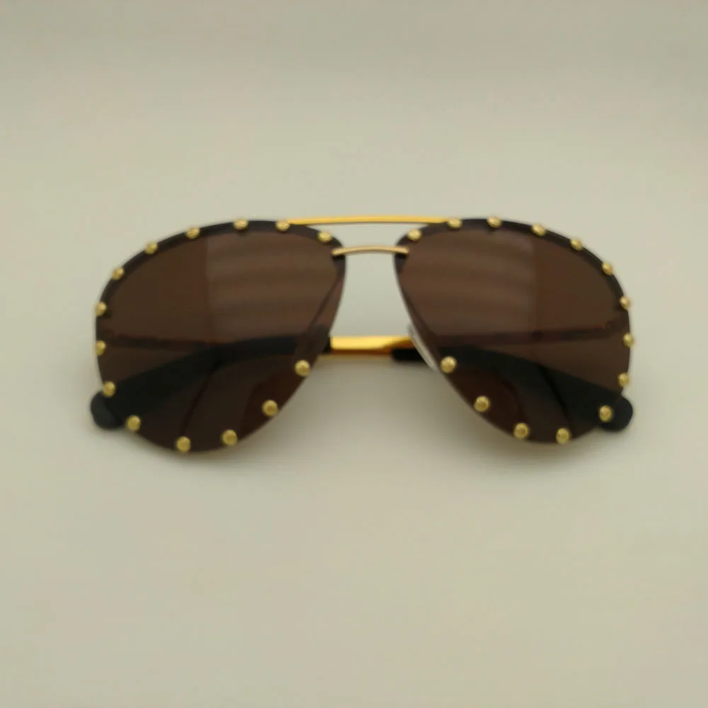 

Fashion Party Rimless Sunglasses Vintage Gold Alloy Women Sunglasses Trending Products Yellow Retro Girls Sun Glasses UV400