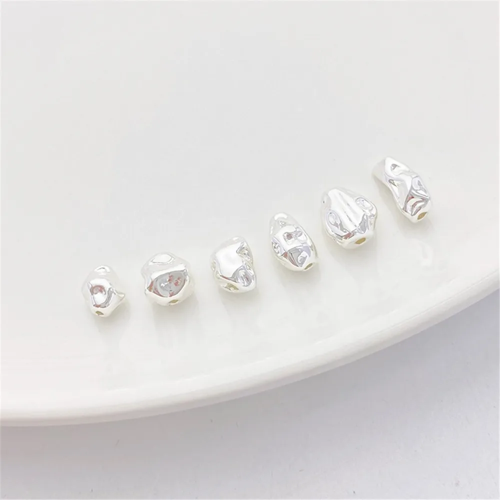 Толстые посеребренные бусины неправильной формы рассыпчатые ручной работы