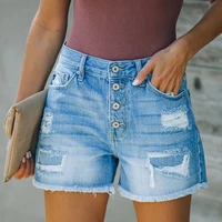 womens new style hole sticking cloth tassel personalized one row button denim shorts hot pants
