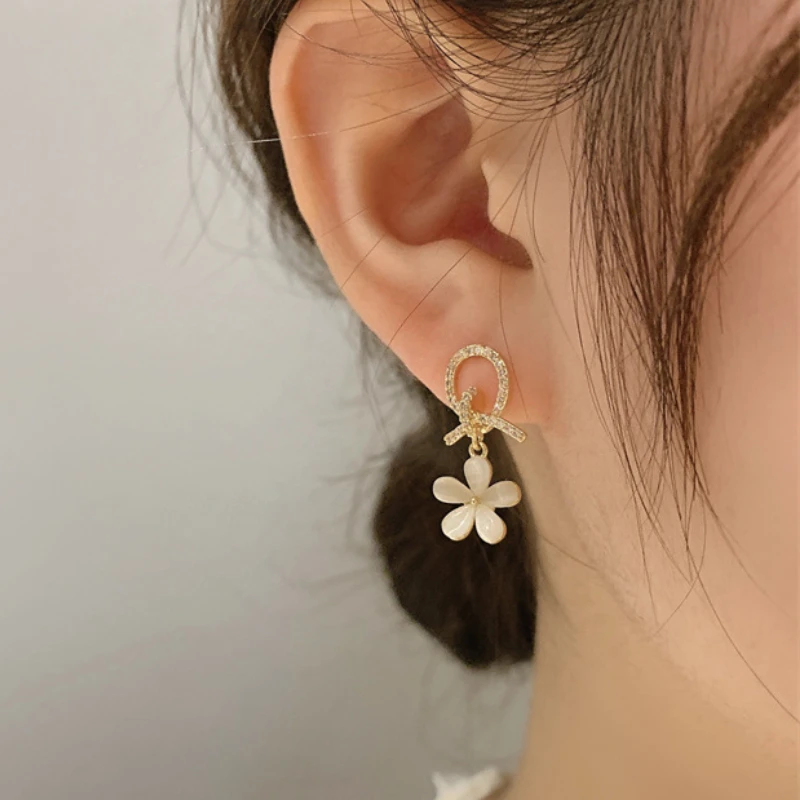 

VSnow Shining Tie Rhinestones Hollow Out Dangle Earrings for Women Temperament Opal Flower Gold Metal Earrings Jewellery