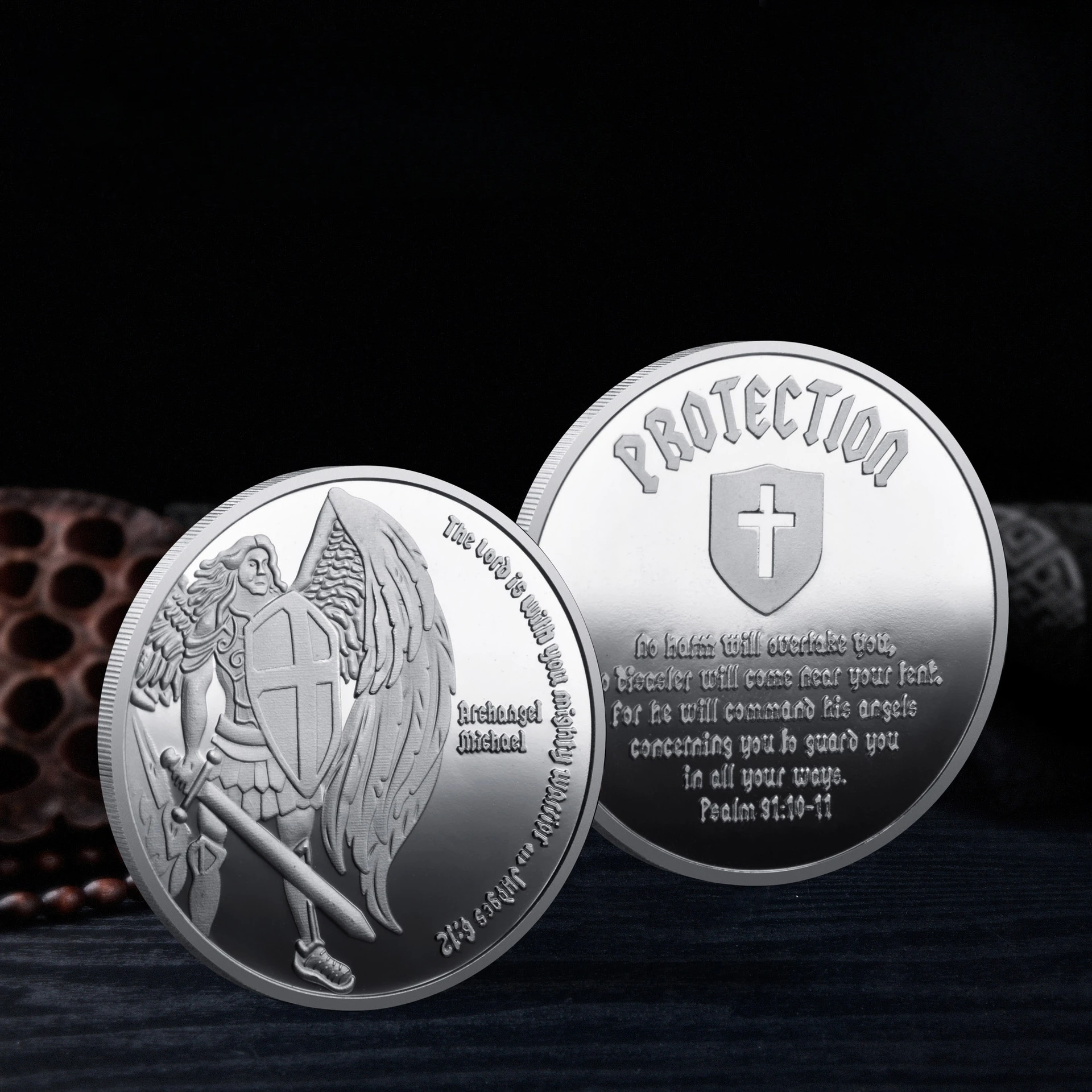 

Коллекционная монета Архангел-хранитель