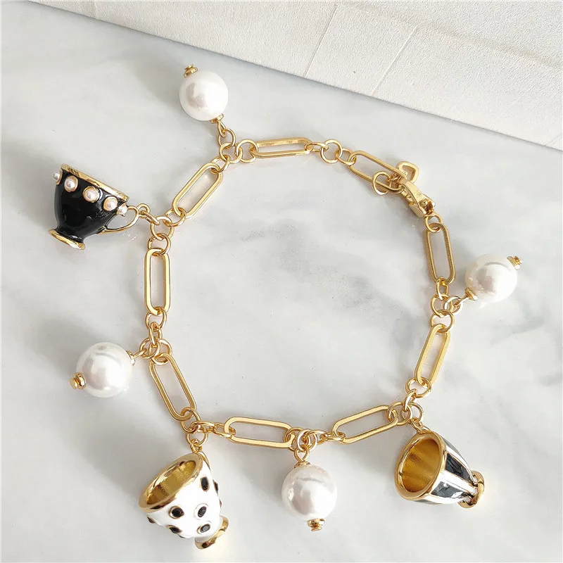 

Simple Enamel and Color Glaze Teacup Set with Multi-Drop Bracelet