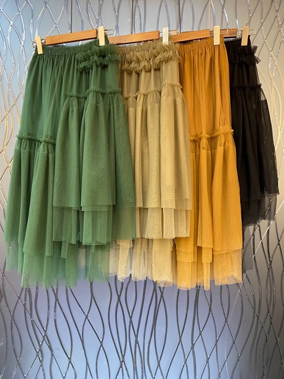 

2022 new women fashion elastic waist irregular tailoring decorative solid color all-match mid-length skirt 0104