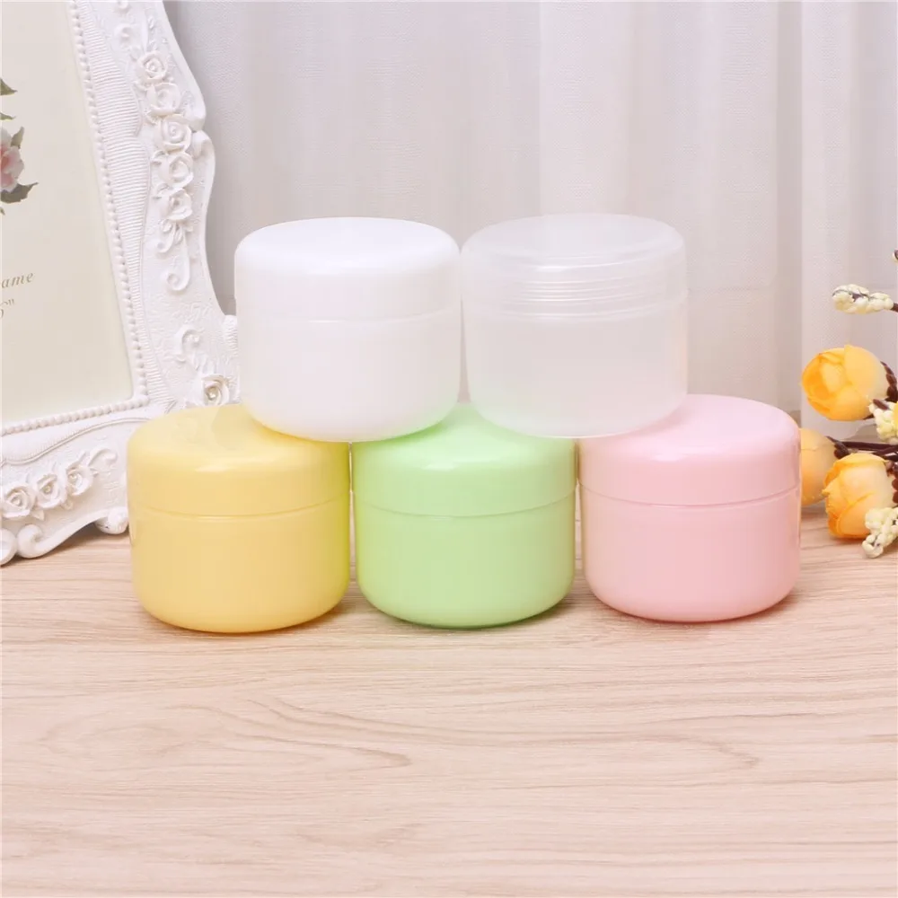 

5-color plastic cosmetics travel empty cans cosmetic cream container 10g / 20g / 50g / 100g color random massage